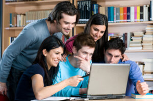 young people excited with the laptop
