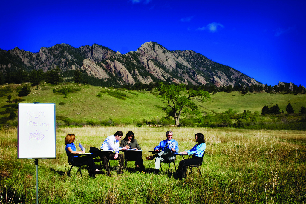 meeting outside with tables and computer