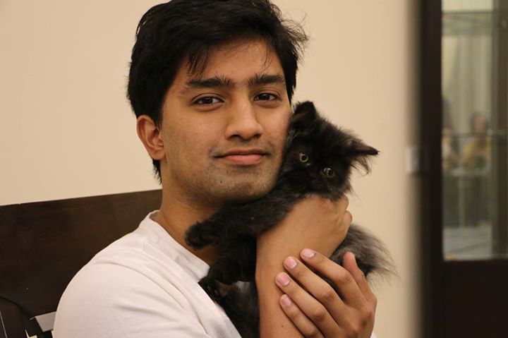 riaz with his kitten Oreo