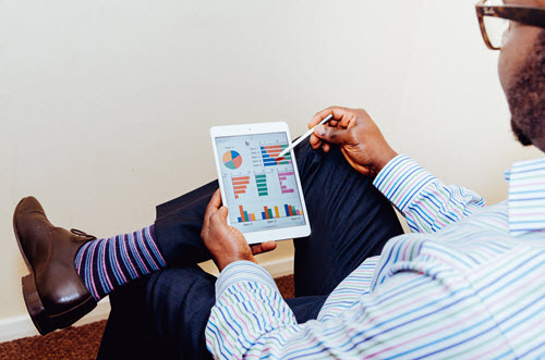 businessman looking at statistics